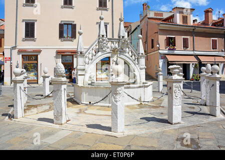 Preseren Square Koper Slovenia, Istrian Peninsula,The Da Ponte Fountain and pilasters said to be modelled loosely on the Rialto Bridge in Venice Stock Photo