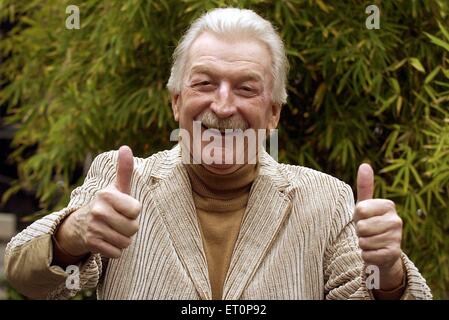 FILE - A file picture dated 06 November 2003 shows German band leader and composer James Last giving a thumbs up in Berlin, Germany. Last has died at the age of 86 in Florida, USA, on 09 June 2015, his long-time concert organiser Semmel Concerts said on 10 June 2015. Photo: Andreas Altwein/dpa Stock Photo