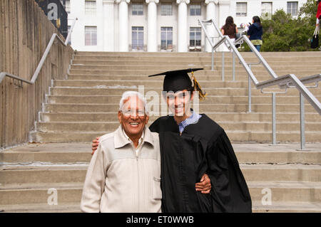 Grandson with grandfather on convocation function at Berkeley University ; California ; USA United States of America MR#782 Stock Photo