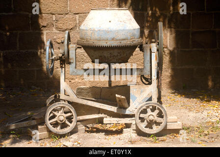 Small hand mixer of cement concrete ; Pune ; Maharashtra ; India ; Asia Stock Photo