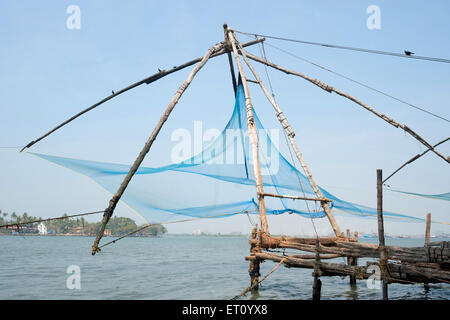 Chinese fishing nets ; shore operated lift nets ; Cheena vala ; Cochin ; Kochi ; Kerala ; India ; Asia Stock Photo