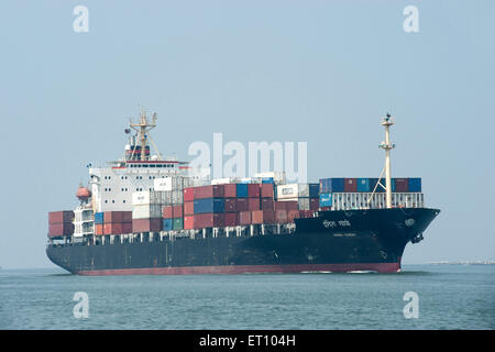 Indira Gandhi cargo ship loaded with containers in sea Cochin Kochi Kerala India Stock Photo