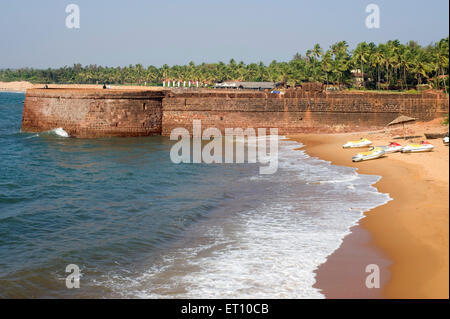 Lower fort aguada and dense coconut palms at sinquerim beach ; Goa ; India Stock Photo