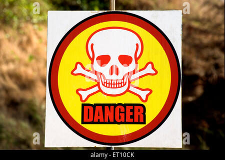 Danger sign at sinquerim beach ; Goa ; India Stock Photo