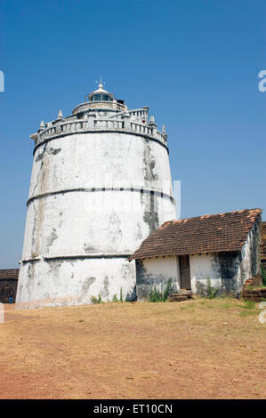 Light house and houses at upper fort aguada  ; Goa ; India Stock Photo