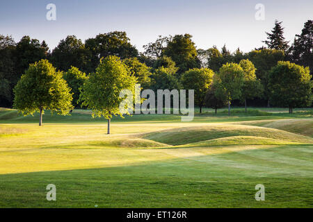 A bunker on a typical golf course in early morning sunshine. Stock Photo