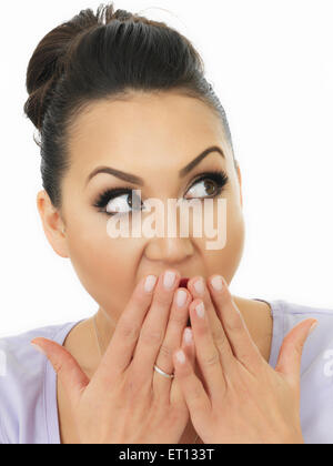 Portrait Of A Very Shocked And Surprised Beautiful Young Hispanic Woman In Her Twenties Covering Her Mouth With Her Hands Stock Photo