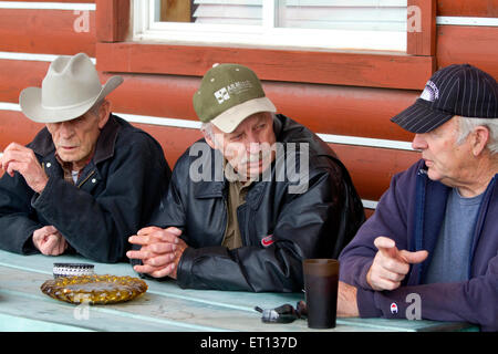 Young Rural Smokers Old farmer smoking a cigarette outside a cafe in eastern Idaho, USA ...