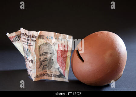 piggy bank, money bank, Indian currency, one thousand Rupee note Stock Photo