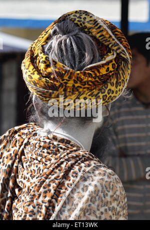 Sadhu with turban shirt of leopard print material ; Kedarnath ; Uttaranchal ; Uttarakhand ; India Stock Photo