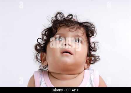Baby boy looking above MR#719C Stock Photo