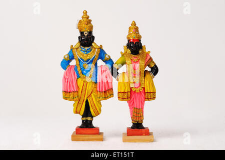 Clay statues of lord vitthal rakhumai Stock Photo