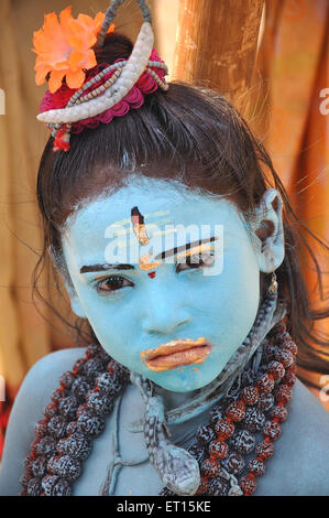 Young boy in Lord Shiva makeup costume fancy dress ; Pushkar ; Rajasthan ; India Stock Photo