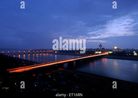 Hotel Patang on Nehru Bridge and Skyline by night Sabarmati River Ahmedabad Gujarat India Asia Stock Photo