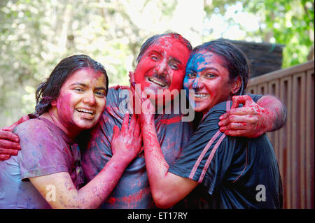 Family Celebrating Holi Festival India Asia indian family Stock Photo