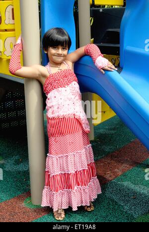 Indian young girl child in modern fashion dress standing - MR#364 - rmm 167152 Stock Photo