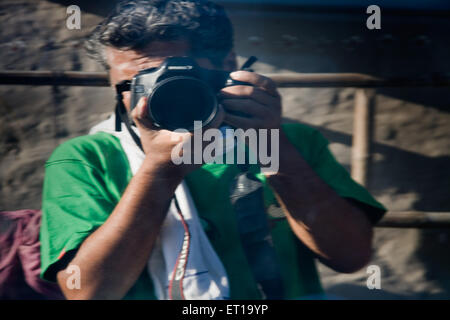 Photographer ; Ravi Shekhar with camera ; Nandur ; Marathwada ; Maharashtra ; India ; MR#202 Stock Photo