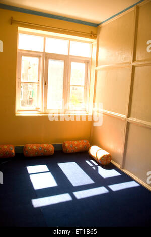 Sunlight falling on carpet through window ; Srinagar ; Jammu and Kashmir ; India Stock Photo