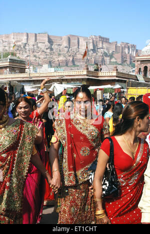 Kinnars dancing in procession of national convention ; Jodhpur ; Rajasthan ; India NOMR Stock Photo