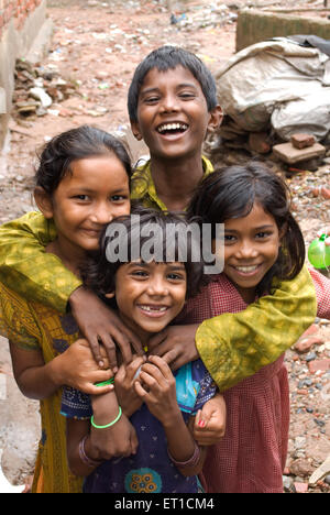 Smiling children in slum , Ahmedabad , Gujarat , India , Asia Stock Photo