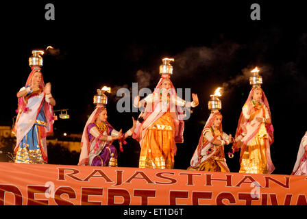 Fire dance ; Dedansar Stadium ; Desert Festival ; Jaisalmer ; Rajasthan ; India ; Asia ; Asian ; Indian Stock Photo