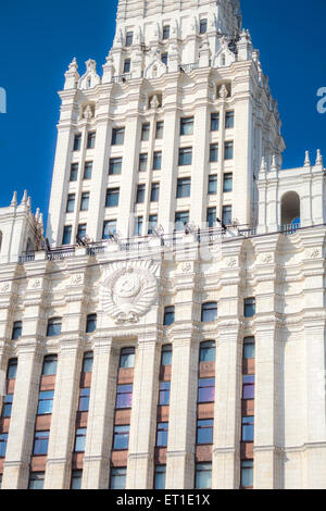 Close up of the Soviet Union State Emblem on the Red Gate Building is one of seven Stalinist skyscrapers, designed by Alexey Dus Stock Photo