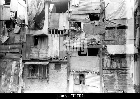 Slum makeshift houses at Bandra Station Bombay Mumbai Maharashtra India Indian slums Stock Photo