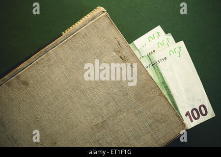 Simple conceptual composition symbolically presenting value of books. Stock Photo