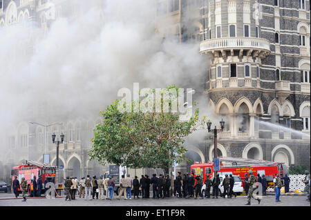 Fire Brigade trying extinguish fire wing Taj Mahal hotel ; terrorist attack Deccan Mujahedeen 26th November 2008 in Bombay Stock Photo