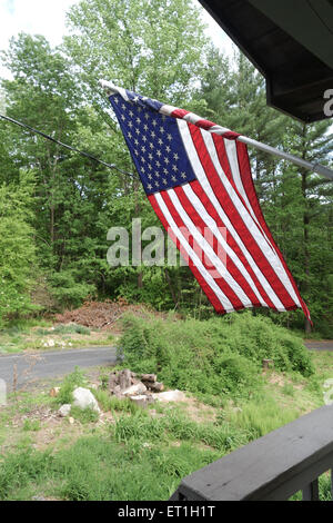 American flag on forest cabin in Pennsylvania. United states, USA. Stock Photo
