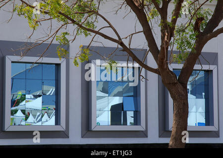 reflection distortion window glass ; Pune ; Maharashtra ; India Stock Photo