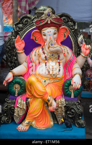 Sitting idol of Lord Ganesh Poona Pune Maharashtra India Asia Stock Photo