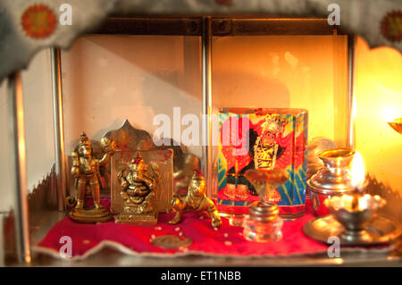 Hanuman Ganesh Krishna idols in prayer room Bombay Mumbai Maharashtra India Stock Photo