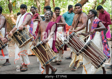Musicians playing jendai drums ; Kerala ; India NOMR Stock Photo