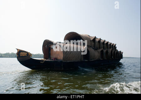 Kettuvallam houseboat with thatched roof in backwaters ; Alleppey ; Alappuzha ; Kerala ; India ; Asia Stock Photo