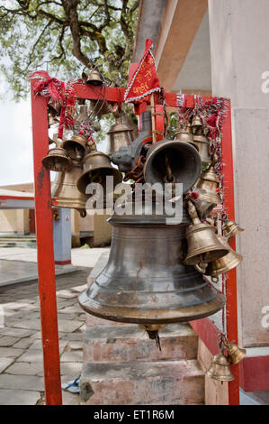 Bells on the gate of shyahi devi temple in  uttarakhand India Asia Stock Photo