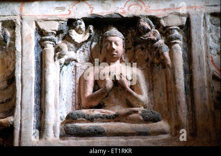 Carved relief of Buddha at Ajanta Caves Aurangabad Maharashtra India indian art asia asian buddha sculpture Stock Photo