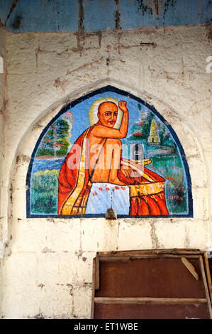 Painting of Gajanan Maharaja on The Wall Maharashtra India Stock Photo