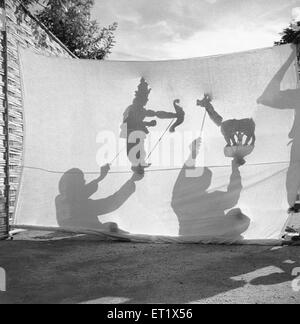 Shadow play, shadow puppetry, shadow show, leather puppets, Hallare, Mysore, Karnataka, India Stock Photo