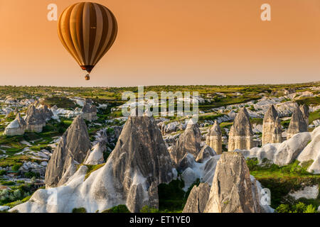 Sunrise landscape with hot air balloon, Goreme, Cappadocia, Turkey