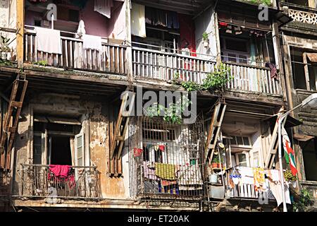 Old chawl Mapla Mahal mass urban housing ; Girgaon ; Jagannath Shankarsheth Road ; Charni Road ; Bombay Mumbai Stock Photo