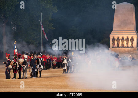 Horse Guards Parade, London, UK. 10th June, 2015. The Household Division Beating Retreat Waterloo 200 takes place on a warm summer evening featuring a musical re-enactment of the Battle of Waterloo. Napoleonic troops advance on the allied line. Credit:  Malcolm Park editorial/Alamy Live News Stock Photo