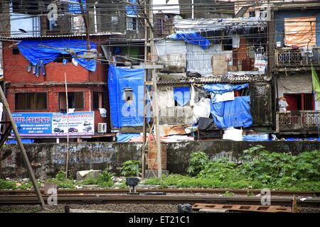 Slum ; Behram Naupada ;  Anant Kanekar Marg ;  Bandra ; Bombay Mumbai ; Maharashtra ; India 24 August 2009 Stock Photo