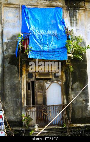 Broken door of chawl ; Lower Parel ; Bombay ; Mumbai ; Maharashtra ; India ; Asia ; Asian ; Indian Stock Photo