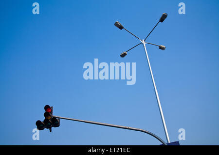 Traffic signal showing red light and lamppost, Bombay, Mumbai, Maharashtra, India, Asia, Asian, Indian Stock Photo