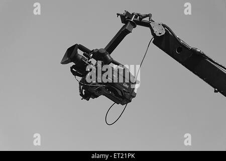 Video camera mounted on crane Stock Photo