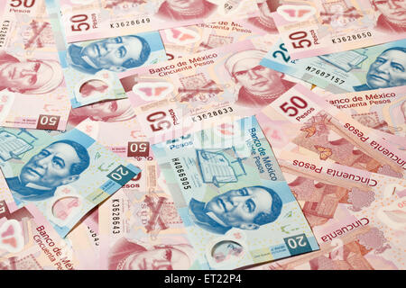 Background of Mexican pesos - 20 and 50 pesos bills Stock Photo