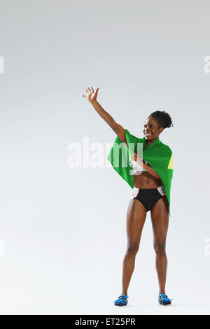 Female Athlete Wearing a Brazilian Flag Stock Photo