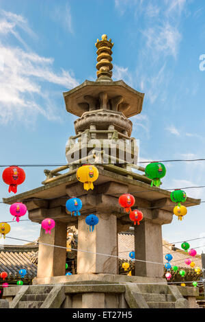 Colorful paper lanterns hang around a stone pagoda at Bulguksa Temple in Gyeongju, South Korea, during Buddha's Birthday. Stock Photo