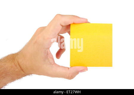 Man hand holding sticky note isolated on a white background Stock Photo